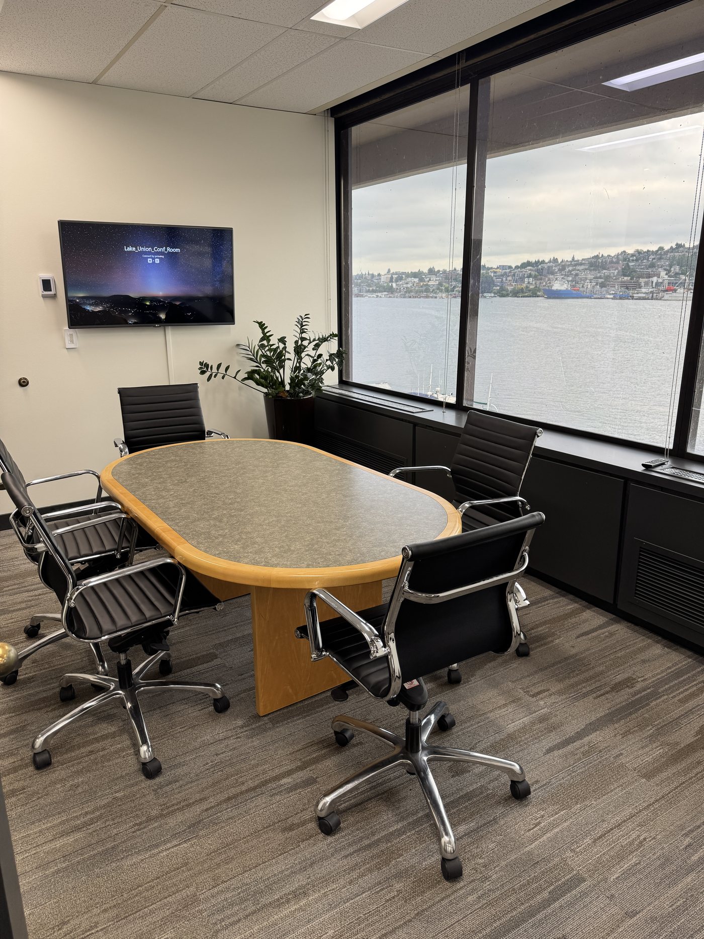 A Coldwell Banker Bain listing strategy discussion at the Lake Union office